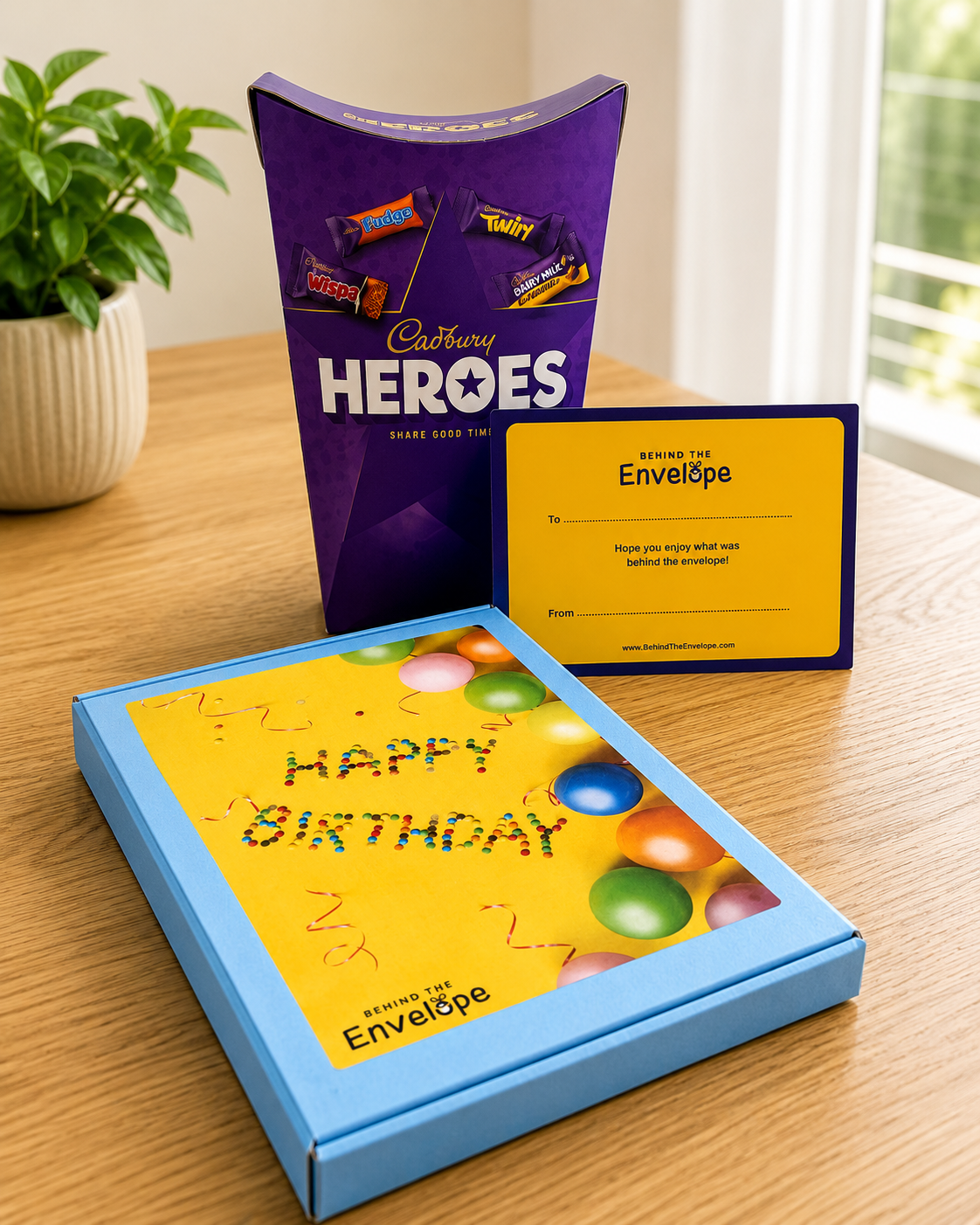 Blue Happy Birthday letterbox gift box with Cadbury Heroes and gift message card