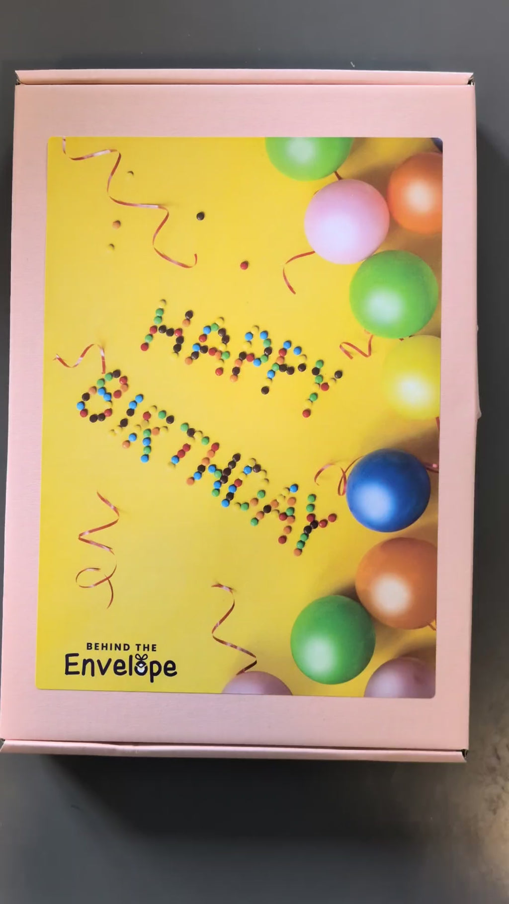 Opening the pink Happy Birthday box filled with Swizzels sweets
