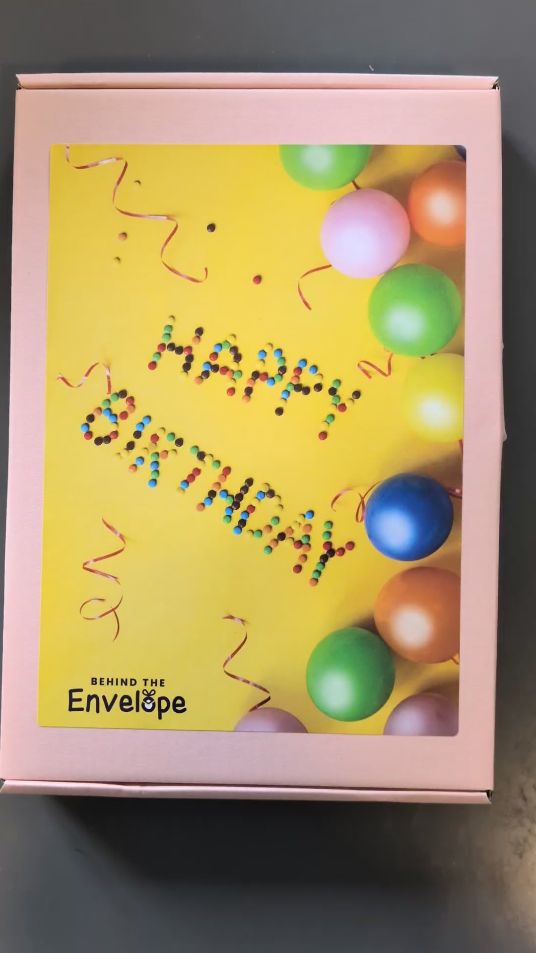 Opening the pink Happy Birthday box filled with Swizzels sweets